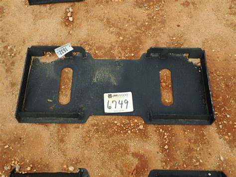 quick attach skid steer plates